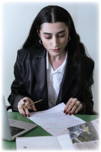 cottonbro-woman-looking-papers-editing-and-proofreading-6