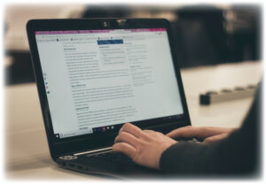 kenny-using-laptop-writing-13