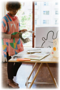 pexels-woman-working-and-standing-research-design-97
